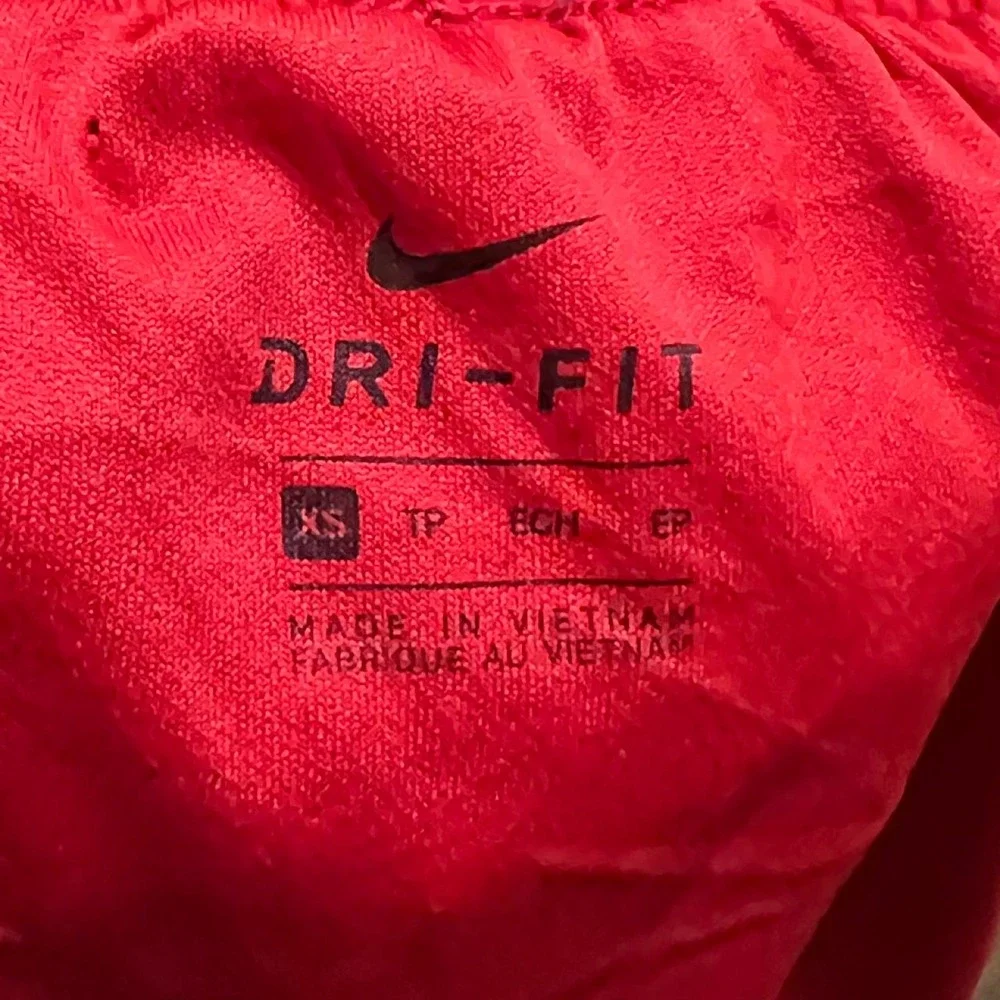 Nike red shorts with white/black side panels, size XS 427.5